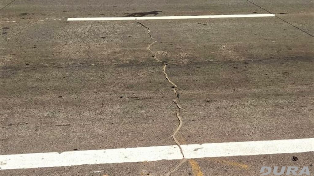 Existing damaged panel of rigid pavement of Mumbai Pune Highway.