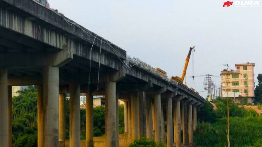 Demolition of existing bridge.