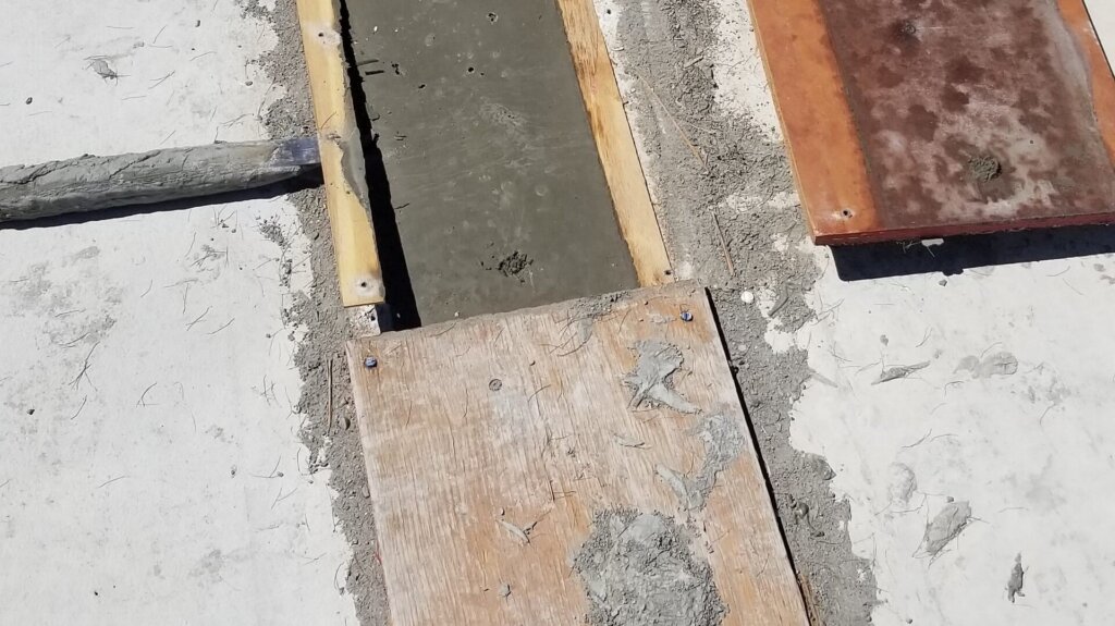 Cover UHPC in-filled with piece formwork.