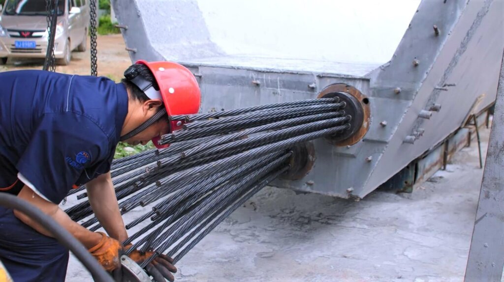 Installation of bearing for post-tensioning works.