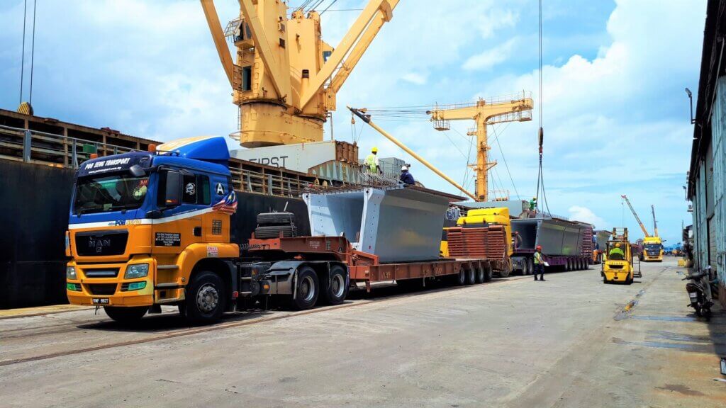 Segments ready to be lifted onto the ship.