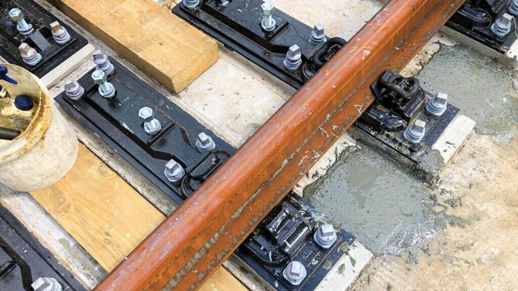 Curing compound applied on the exposed surface of the DURA UHPC.