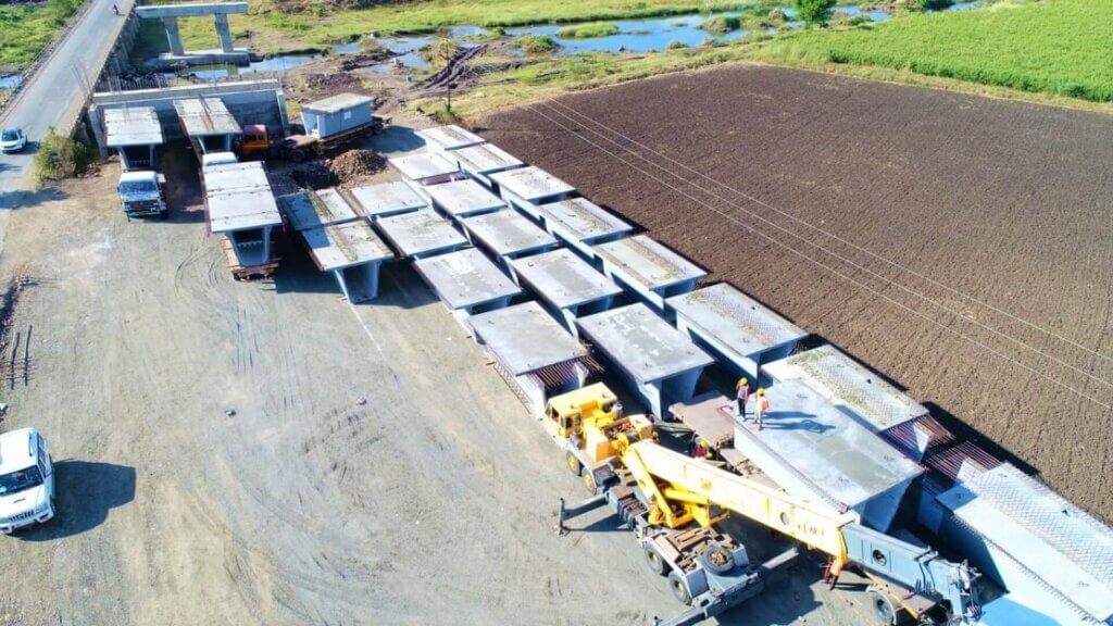 Unloaded box girder at job site.
