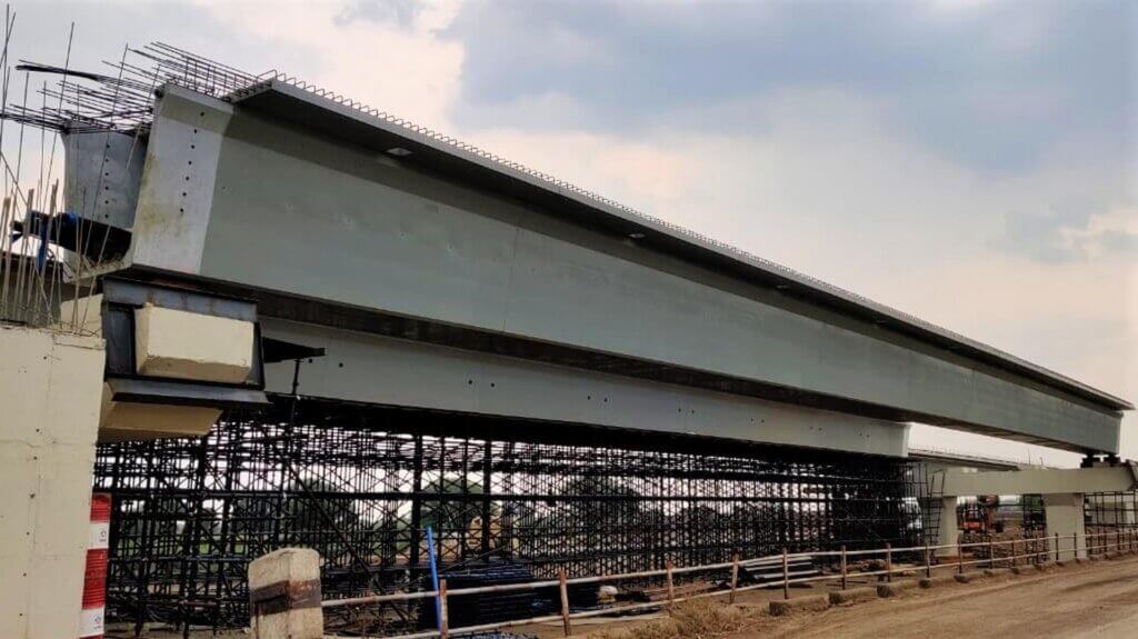 One full beam fully post-tensioned.