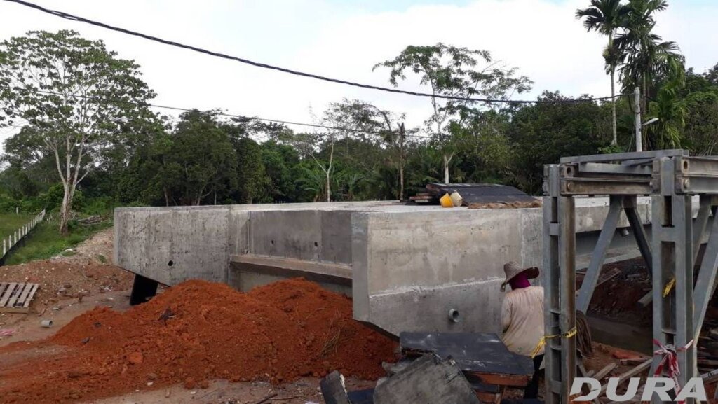 Backfilling of earth behind the abutments