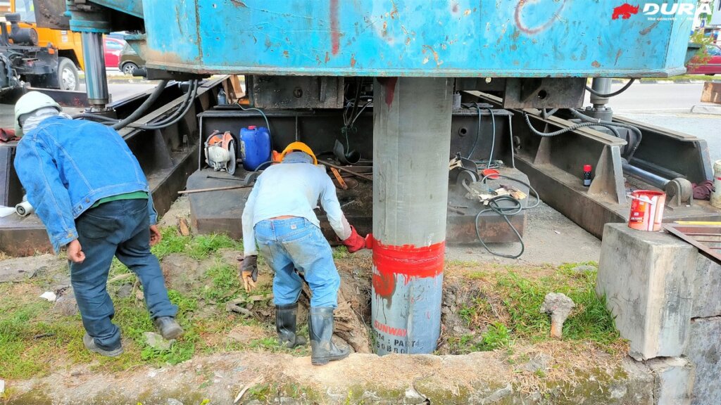 Connecting spun piles.
