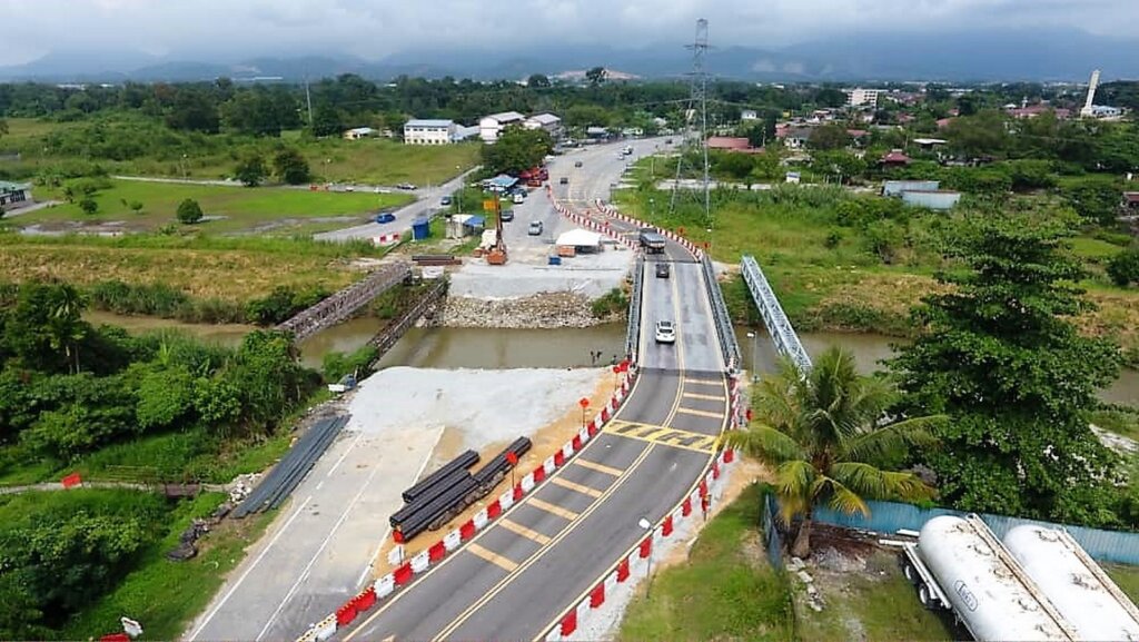 Construction site with a temporary Bailey bridge installed._2