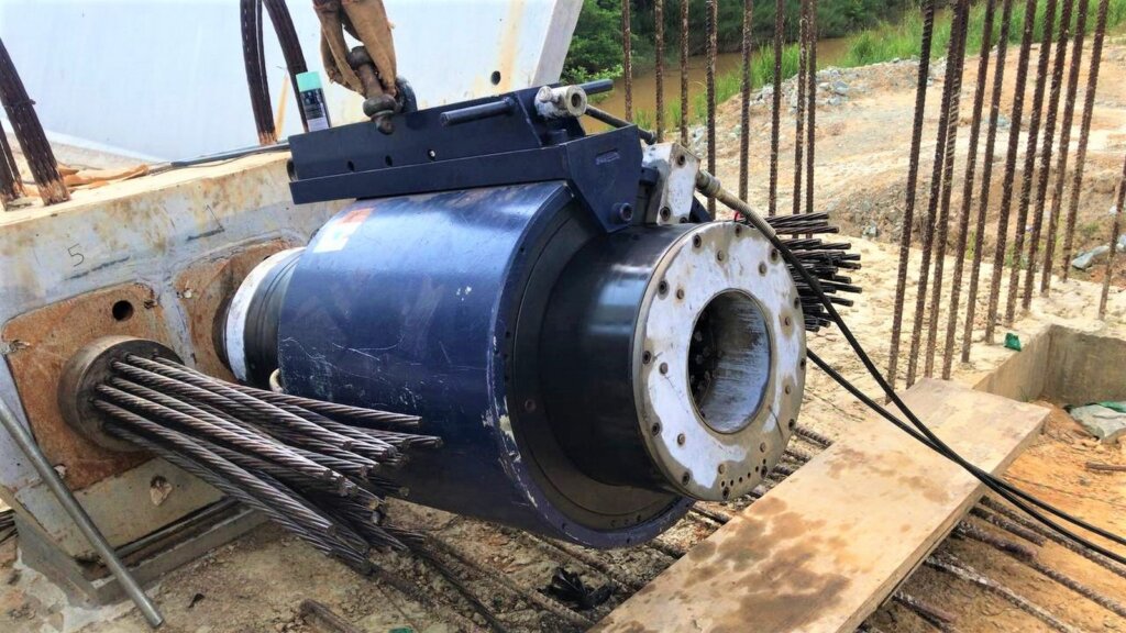 Post tensioning in progress.