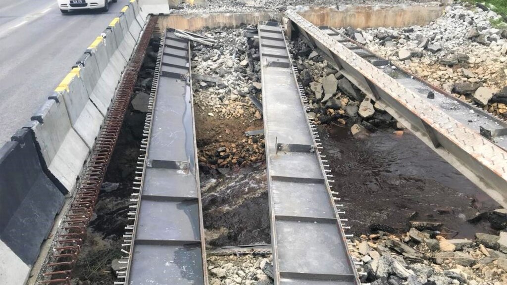 Steel I-beam removed from the site.