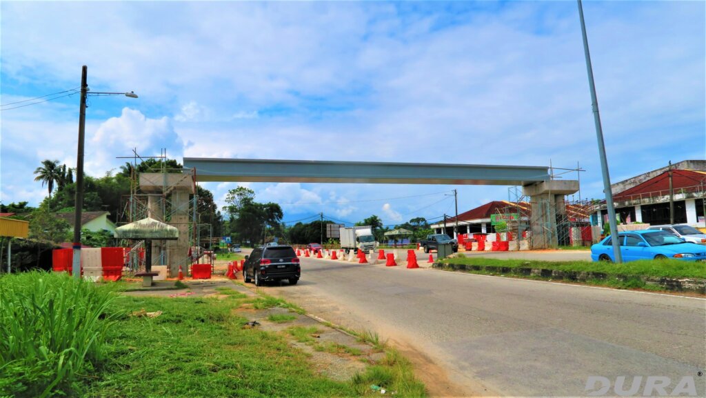 UTG beam span across the busy road.