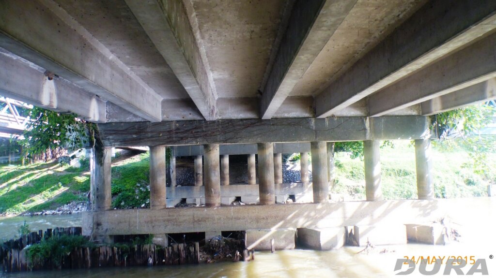 Underneath view of the existing old bridge.