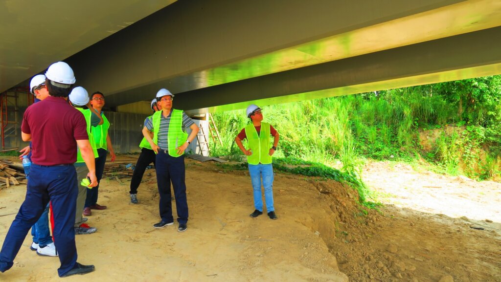 Inspection of UHPC girders at Manong bridge.
