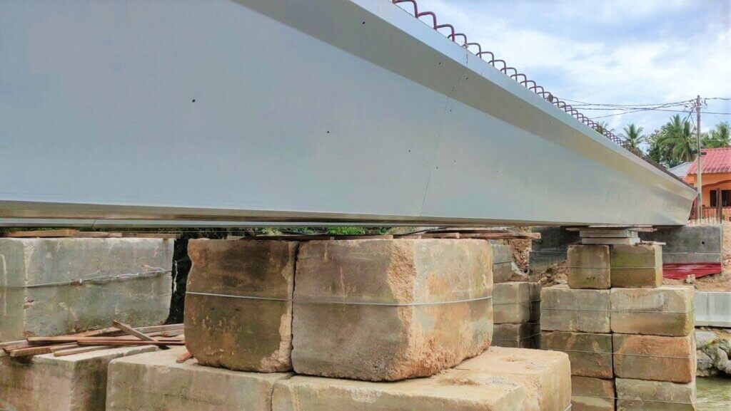 Completion of post-tension works, beams hog as expected.