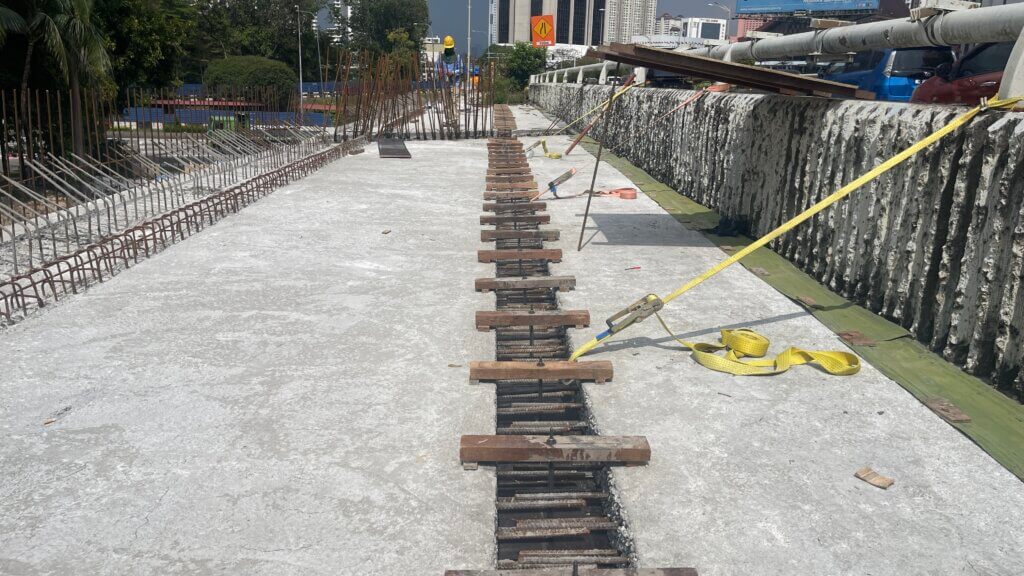 Preparing rebar link slab for stitch using DURA Link Slab.