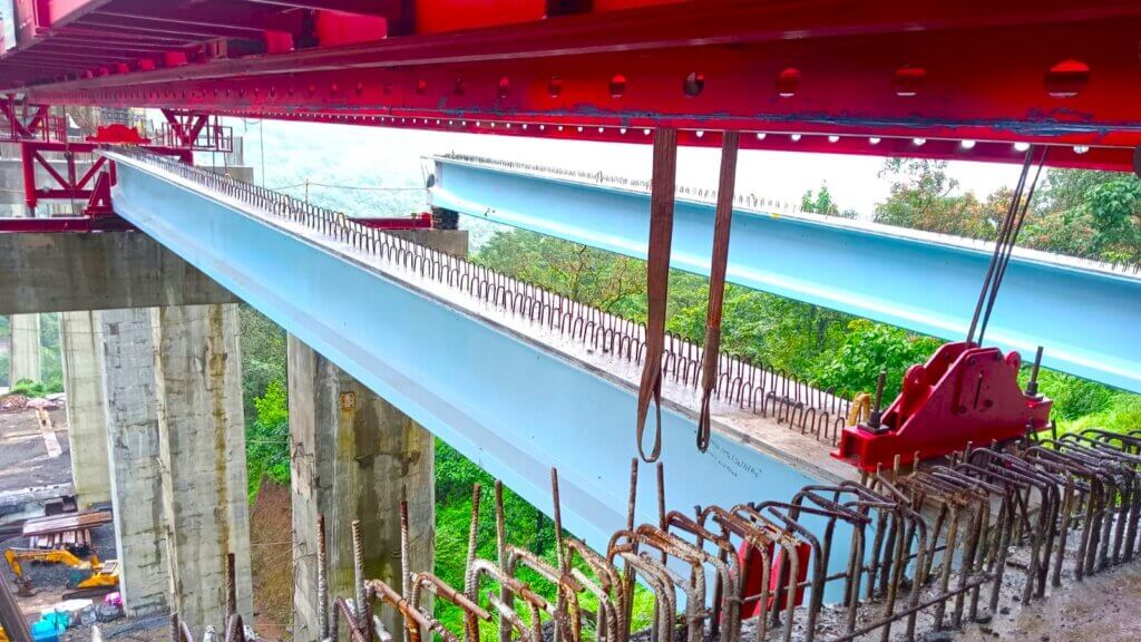 2nd beam positioned onto the piers.(2)