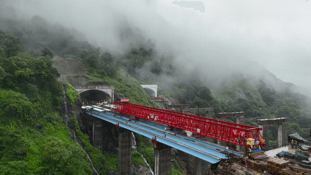 Beam positioning and alignment onto the piers is in progress.