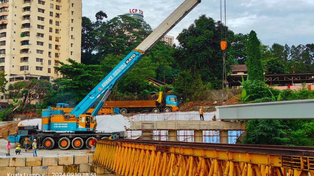13. Positioning the beam to both abutments.