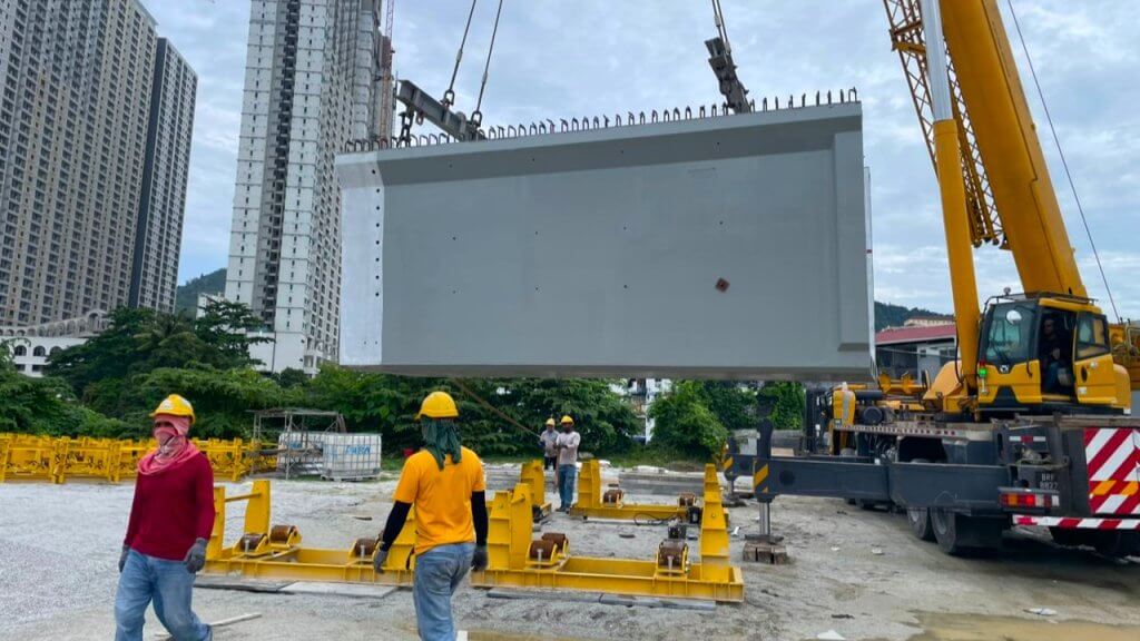 Loading segment onto beam roller.
