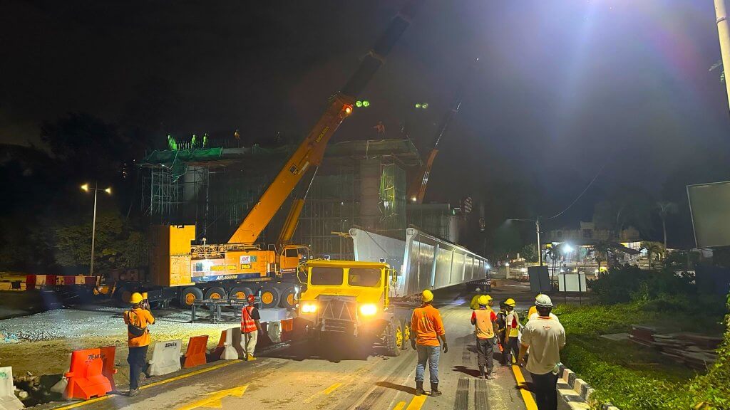 Transferring beam to launch position and getting ready to launch.