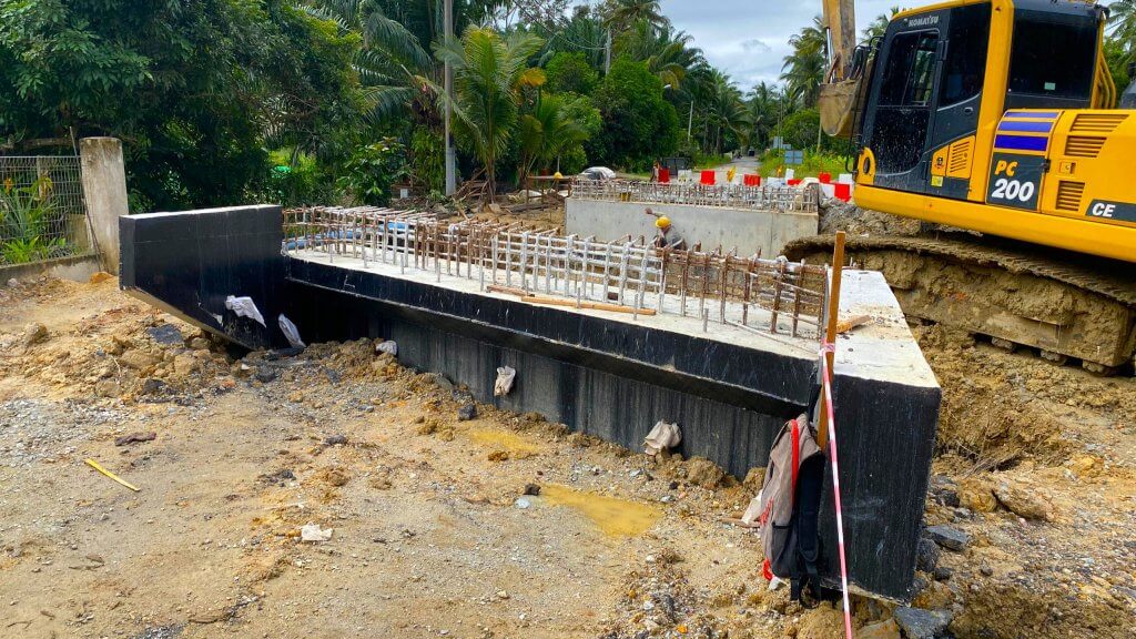 Constructing both abutments.