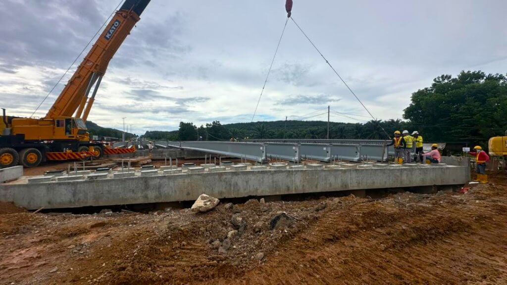 Beam launching works are currently in progress, with the beam for Span No. 2 positioned and aligned onto the abutments.