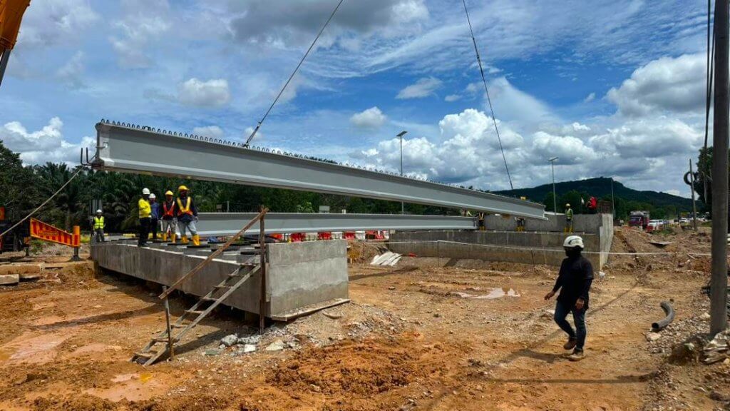 Beam launching works are currently in progress, with the beam for Span No. 3 positioned and aligned onto the abutments.