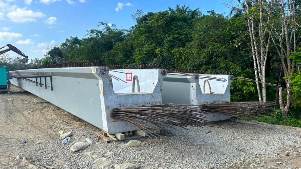 Beam post-tensioning in progress; ready for launch after PT completion.