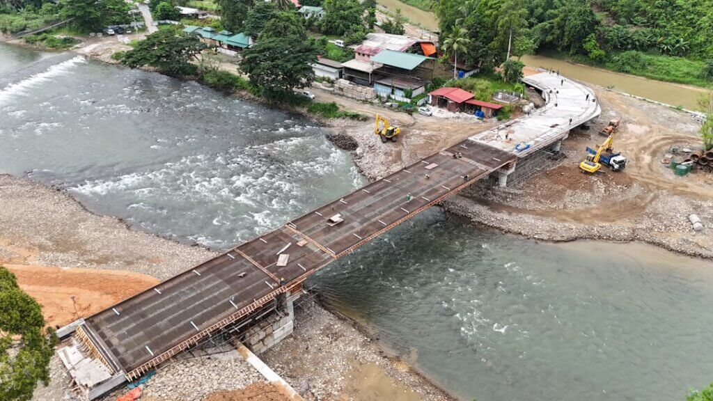 Final level checking and adjustment of the deck slab.