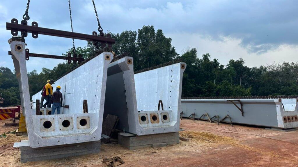 Beam segment connection works underway.