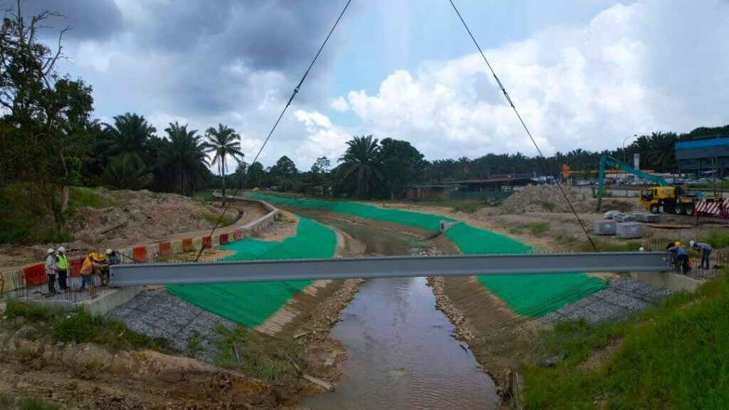 Positioning and aligning the beam onto the abutments.