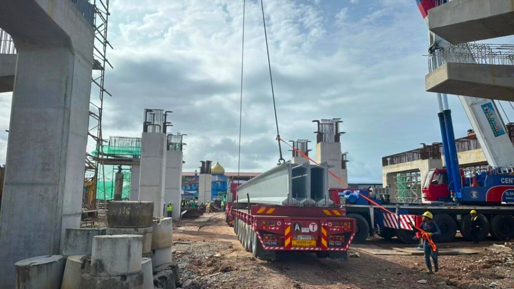 The beam has been safely transported to the designated launching site.